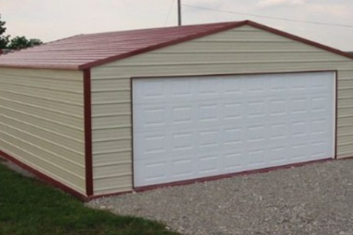 Two-car steel garage, tan walls with red roof and trim